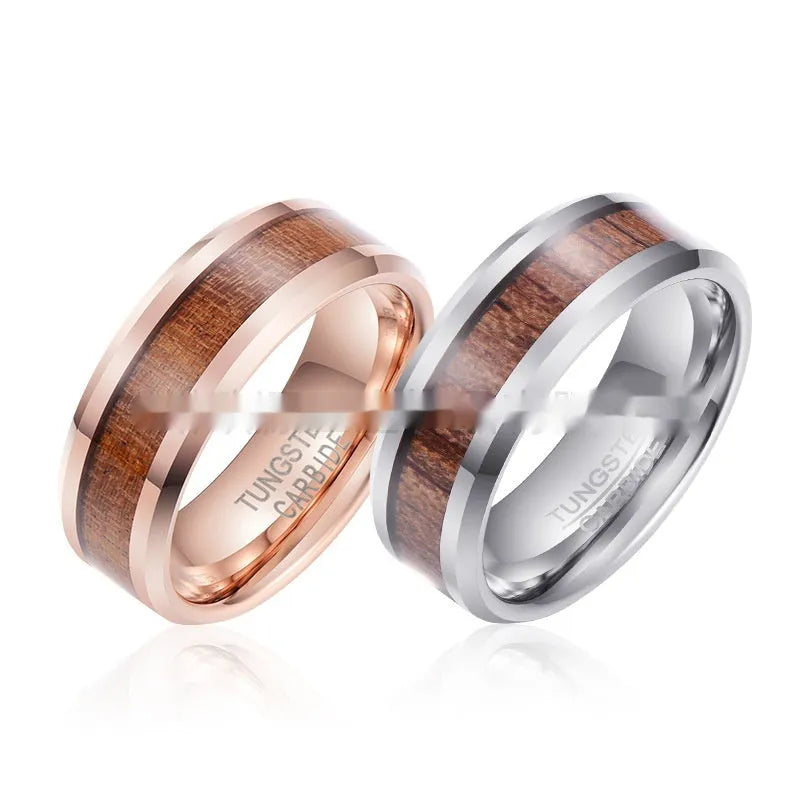 Ugyen men's tungsten ring with wood and leather inlay in 8mm width on a hand.