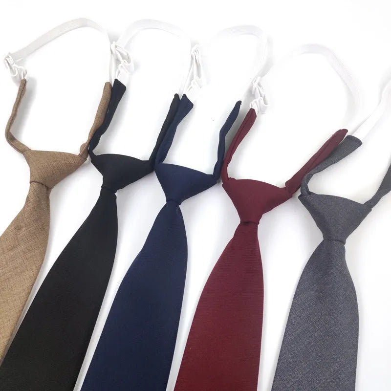 Solid colour cotton bow tie in arrow style showing navy blue option
