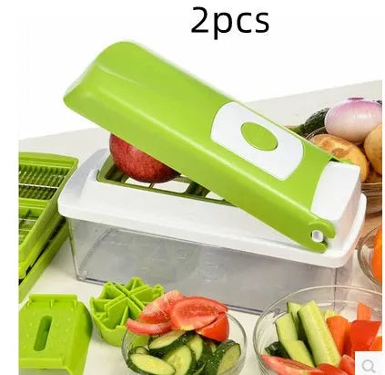 Green 12-piece manual vegetable chopper set with stainless steel blades on kitchen counter