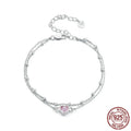 Women's sweet style sterling silver bracelet with a small heart-shaped charm on an adjustable chain.