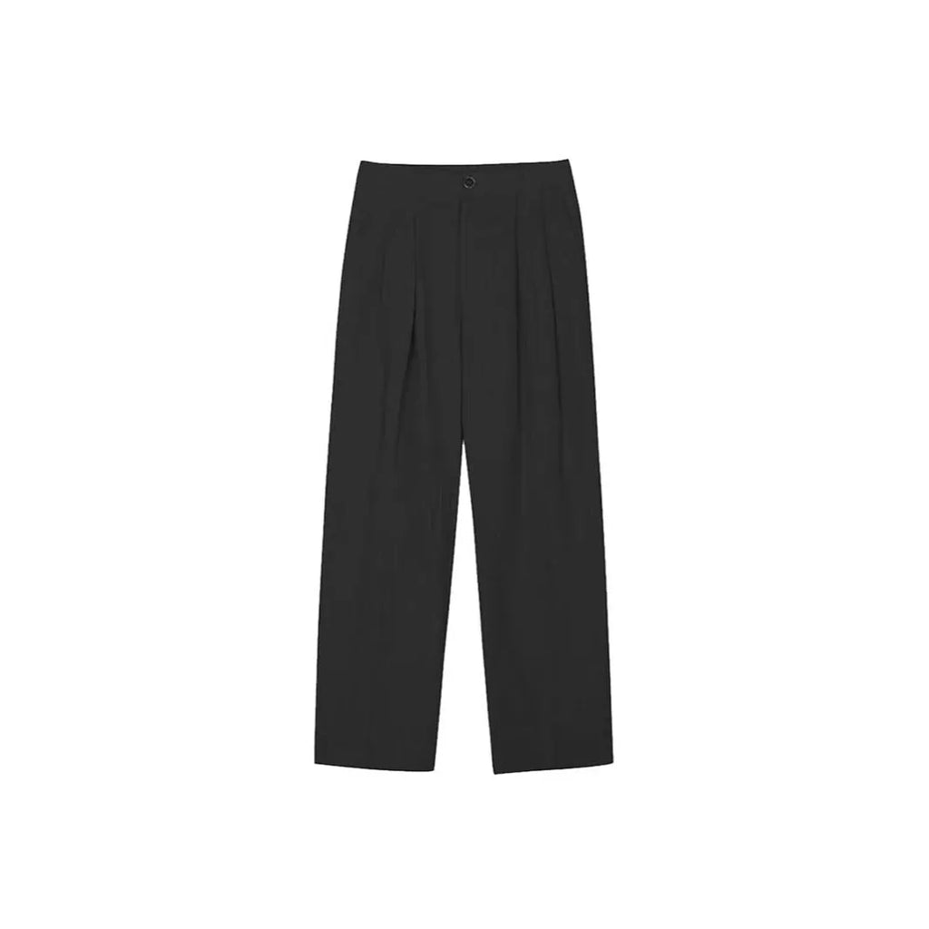 Man wearing apricot wide-leg cotton linen trousers with a mid waist and zip fly.