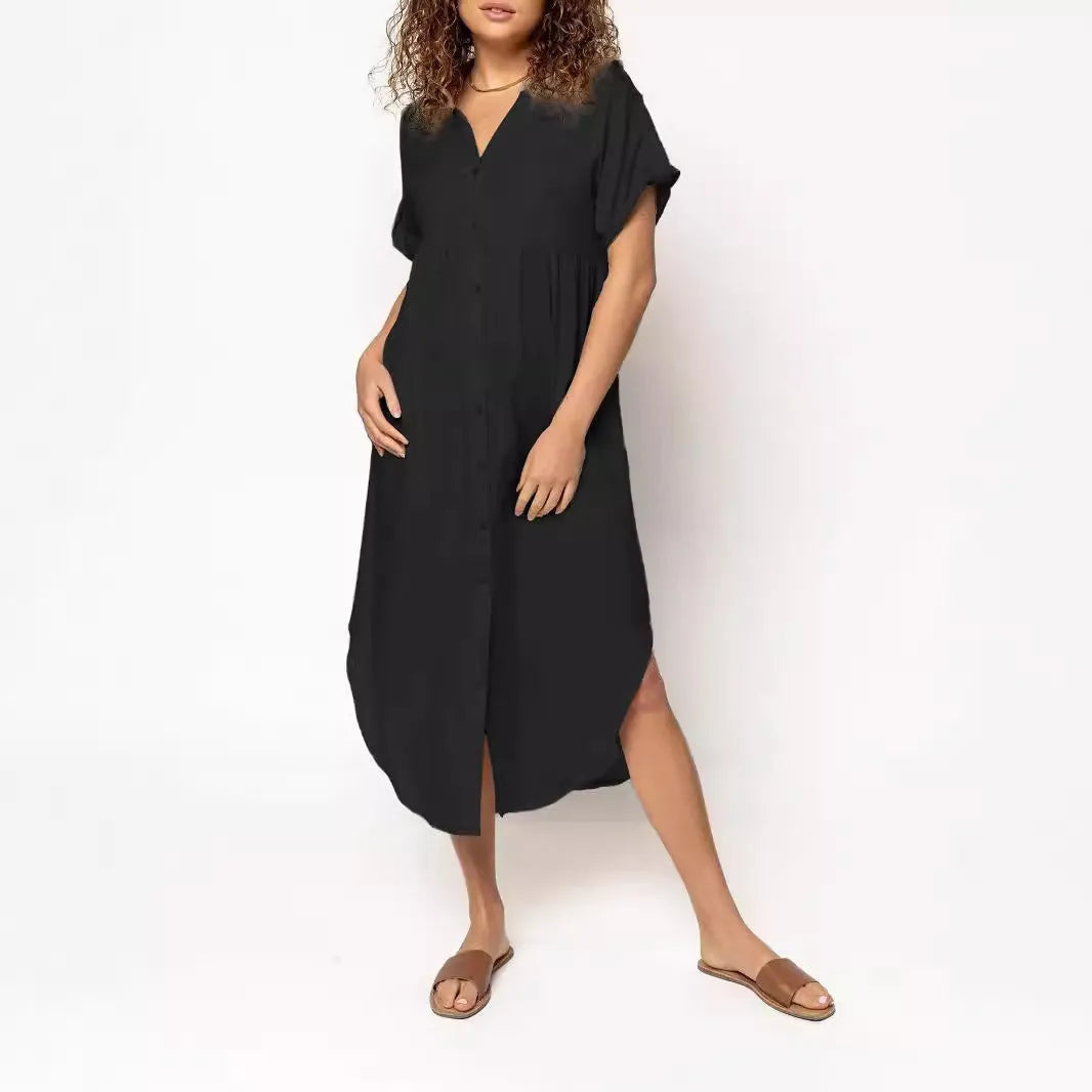 Loose fit solid colour mid-length casual dress with button front detail on a hanger
