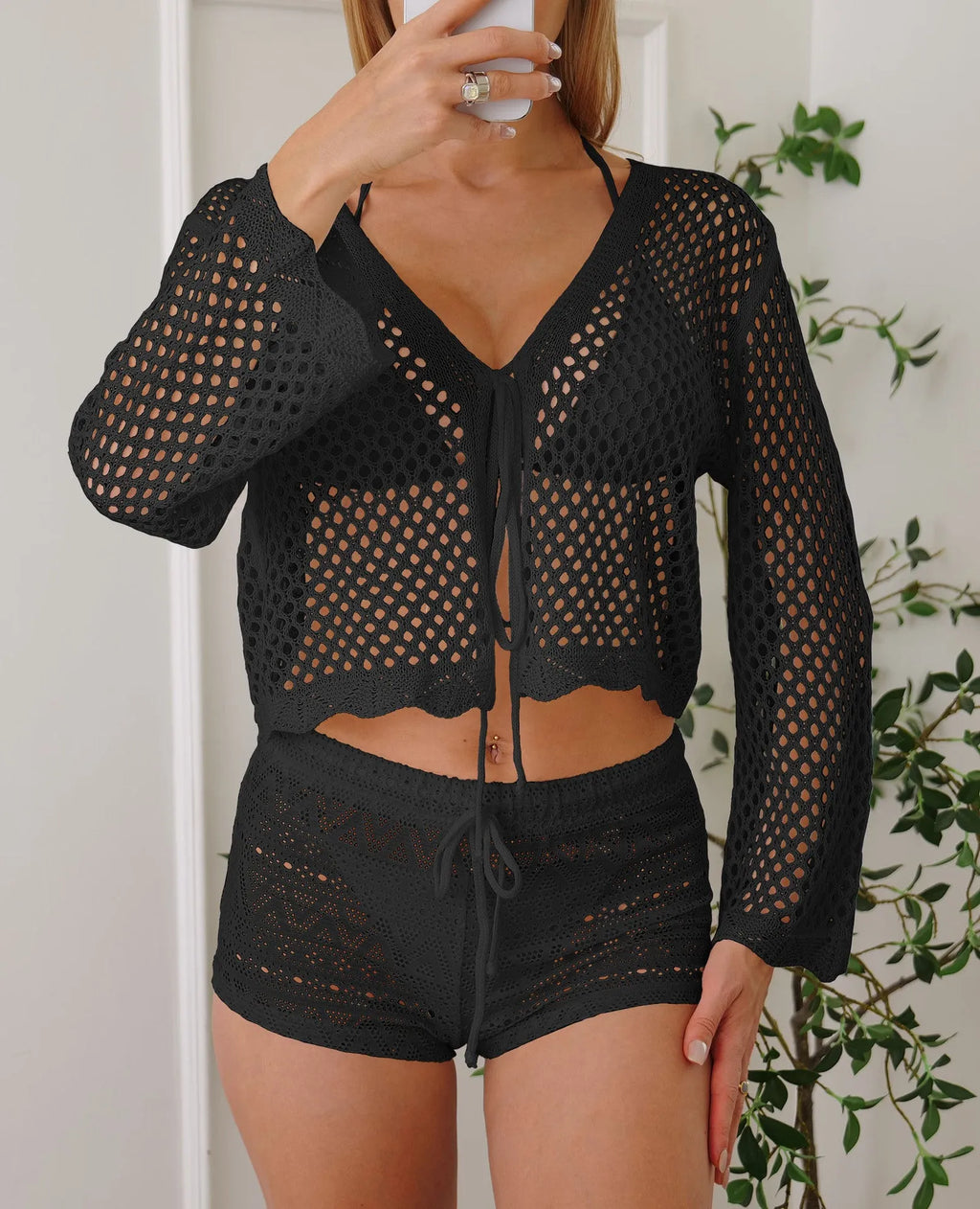 Women's apricot hollow woven cardigan blouse with bell sleeves, short length.
