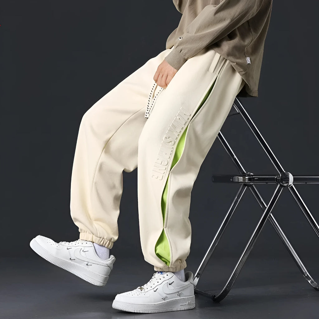 Men's loose cotton trousers with ankle banding and skinny leg design in black colour