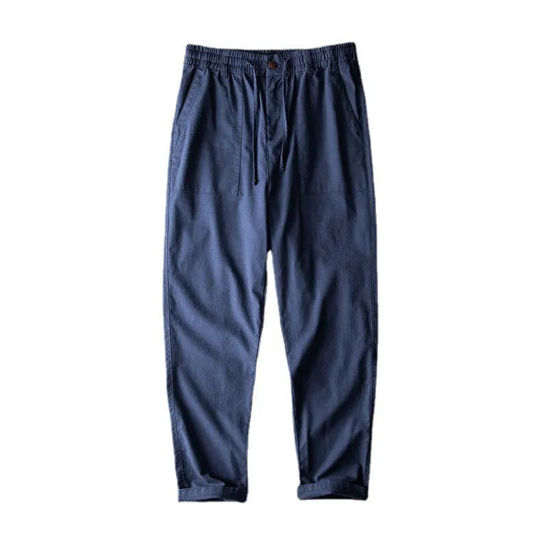 Men's linen casual trousers in navy blue, apricot, and grey colours with mid waist design