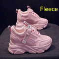 Women's black mesh platform casual shoes with toe holder design on a white background.