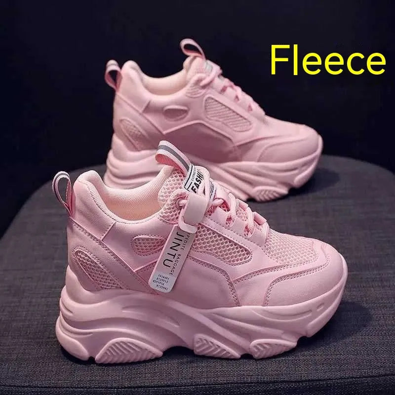Women's black mesh platform casual shoes with toe holder design on a white background.