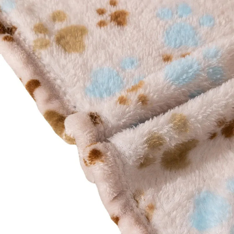 Blue cartoon dog print double-sided thickened flannel pet blanket laid flat.