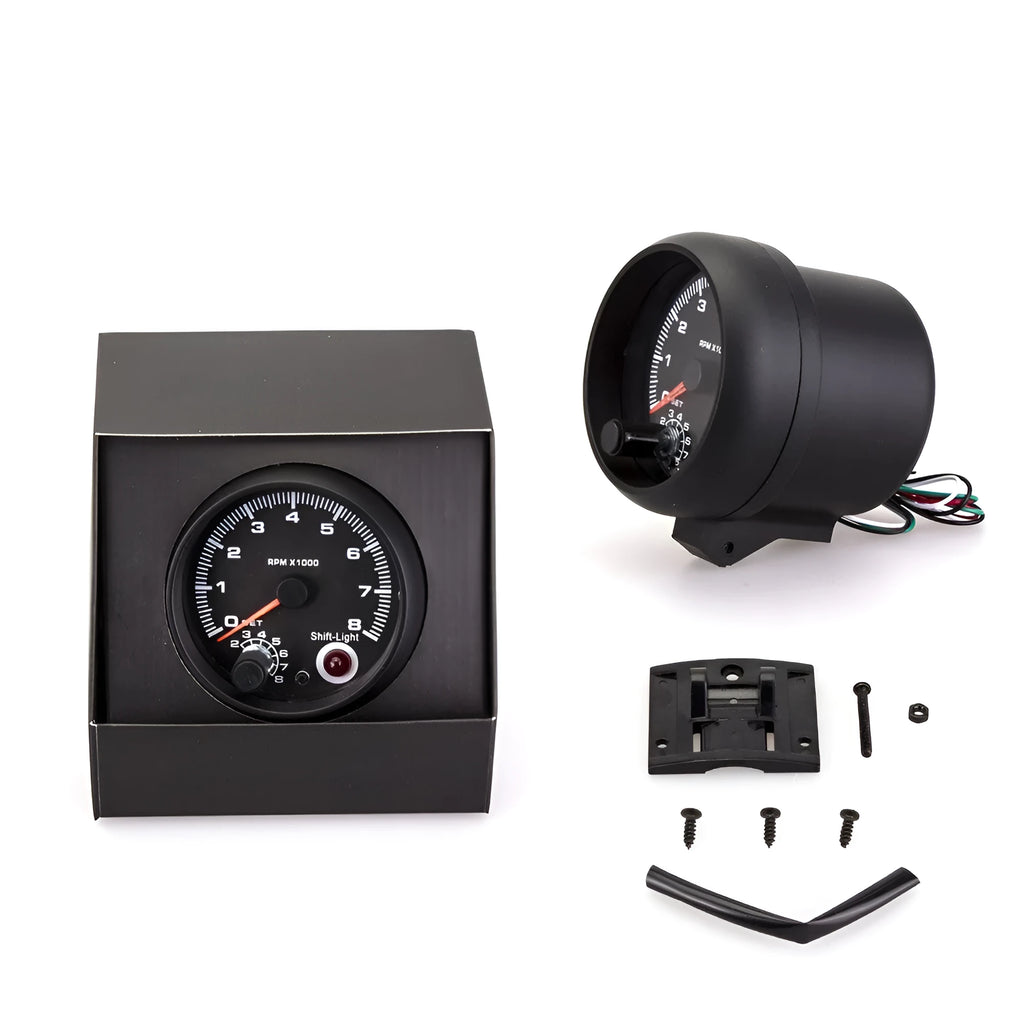 Black automotive tachometer with blue light pointer for car dashboard RPM measurement