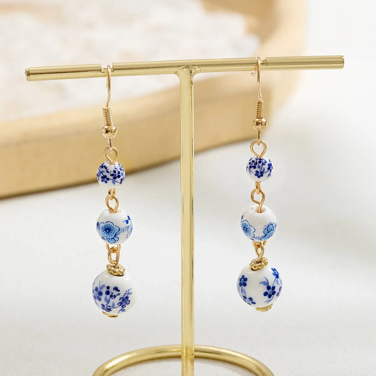 Long blue and white porcelain ceramic bead retro earrings with geometric Chinese style design on alloy.