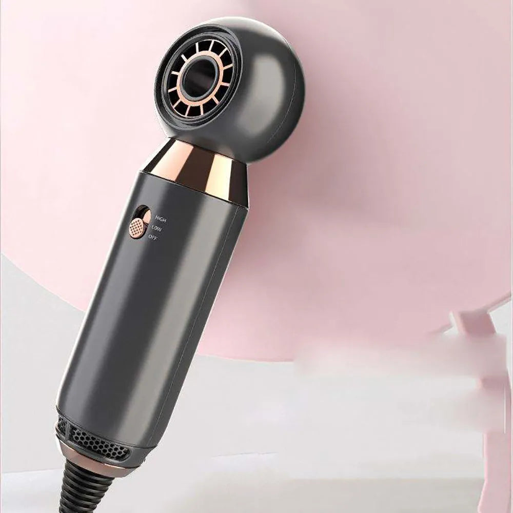 Compact white leafless hair dryer with diffuser attachment, shown with power plug.