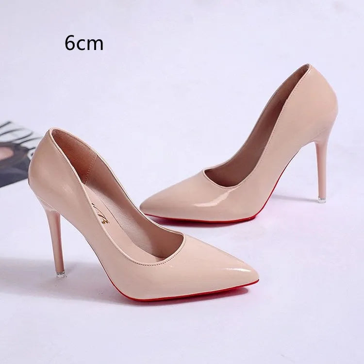 Solid colour women's pointed toe stiletto heel pump shoe in a choice of apricot, black, pink, or white.